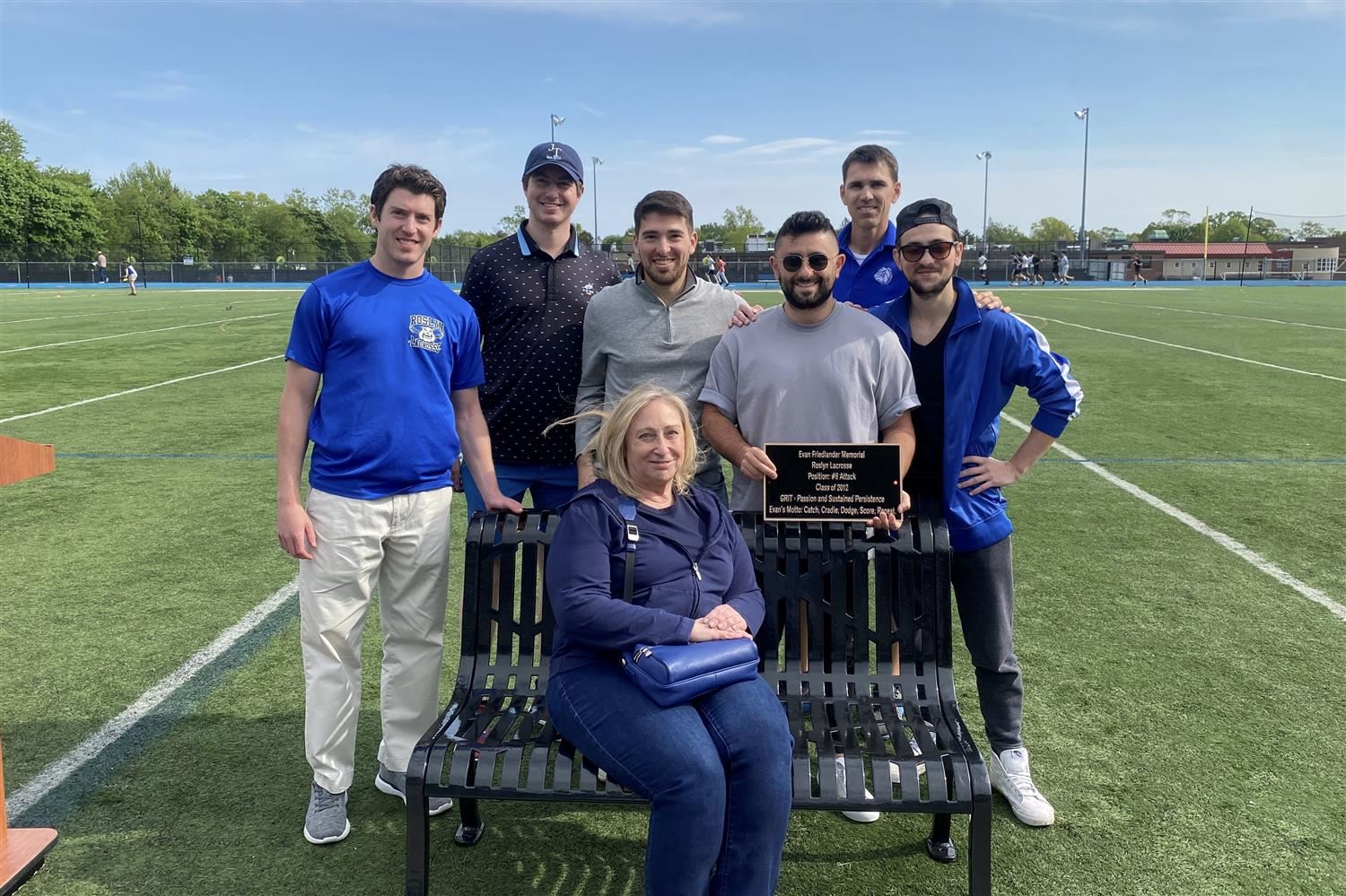  group sitting on bench